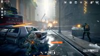 A Division agent takes cover behind a car
