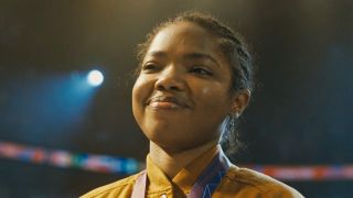 Ryan Destiny smiling in The Fire Inside.