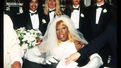dennis rodman signs his autobiography august 21, 1996 in new york city rodman arrived in a horse drawn carriage dressed in a wedding gown to launch his new book called bad as i wanna be photo by evan agostiniliaison