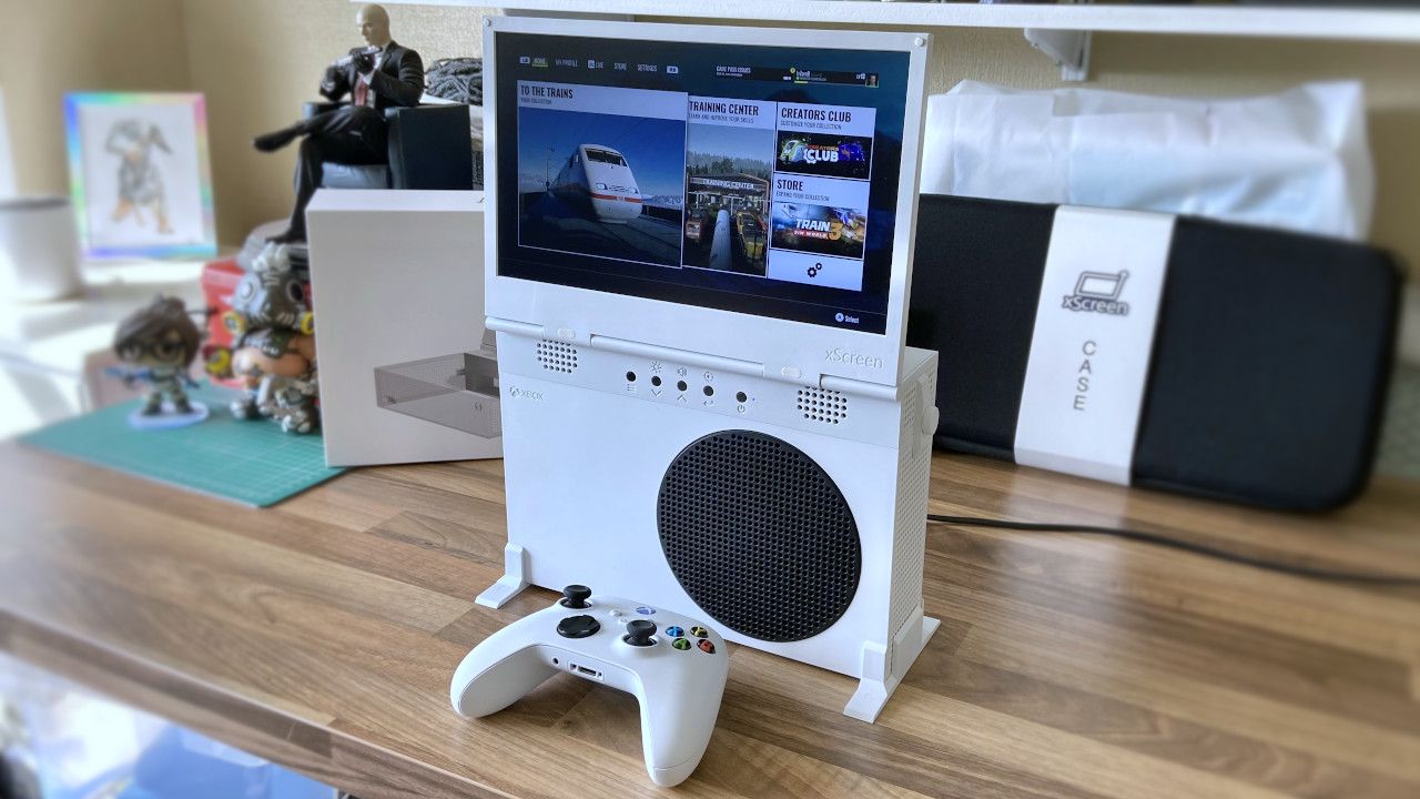 Photograph of the UPSpec Gaming xScreen for Xbox Series S being held by a display stand