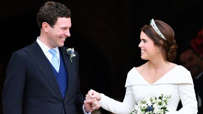 Jack Brooksbank and Princess Eugenie leave St George's Chapel after their wedding ceremony on October 12, 2018 in Windsor