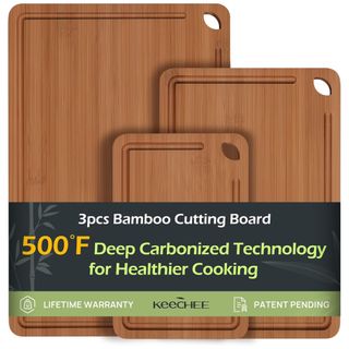 A set of three rectangular bamboo cutting boards in various sizes