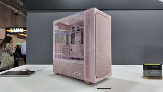 Tryx's Computex 2025 booth, showcasing various new PC cases and coolers.