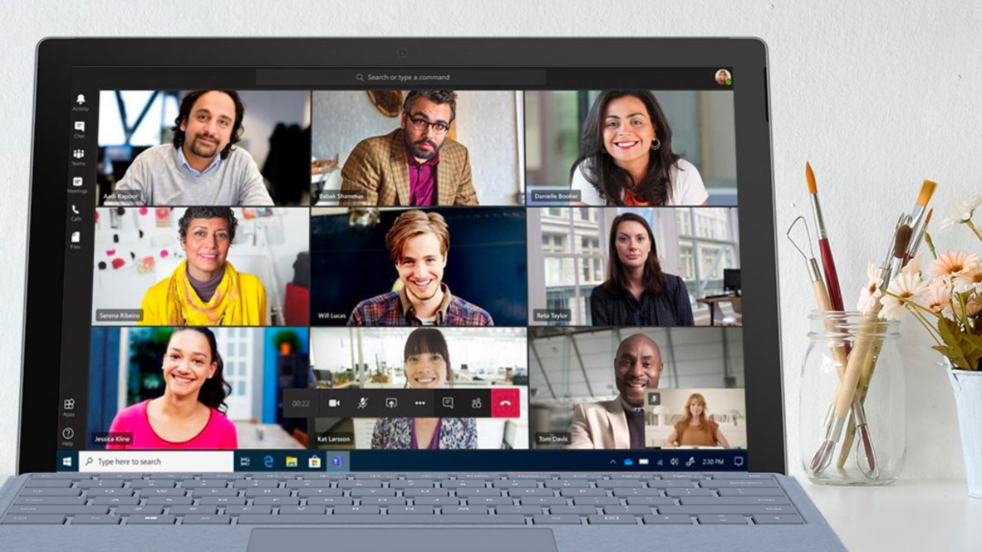 a screenshot of individuals on a video call on a laptop