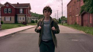 Sophia Lillis stands in the middle of a deserted street in I'm Not Okay With This S1 E1 - "Dear Diary..."