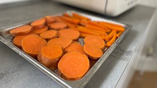 Steamed vegetables on a tray from the Smeg 10-in-1 Countertop Oven