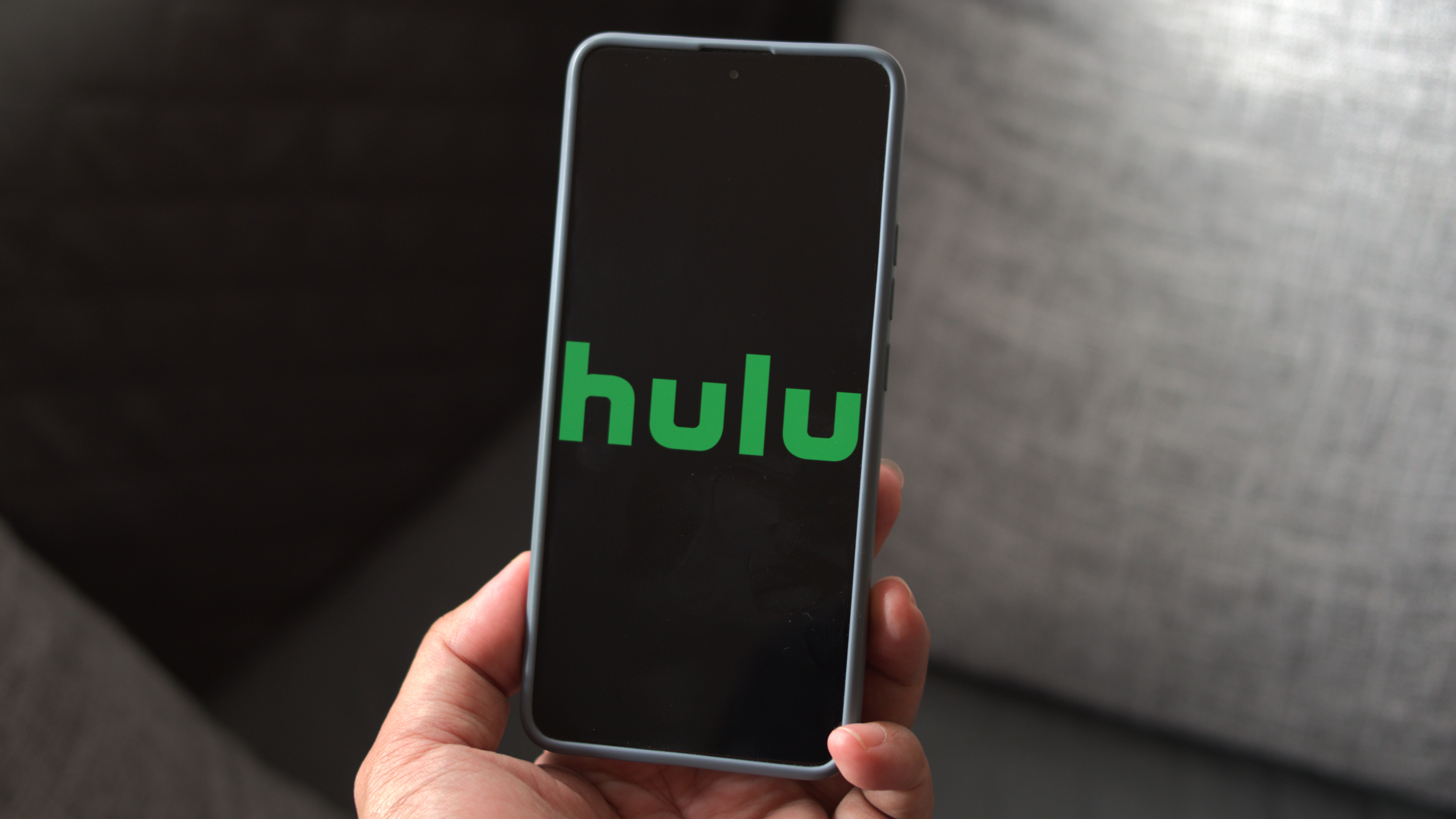 Hulu logo on a phone screen