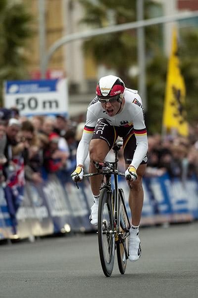 Germany's Tony Martin rides to the bronze medal in Geelong despite a puncture in his front wheel on the first lap.