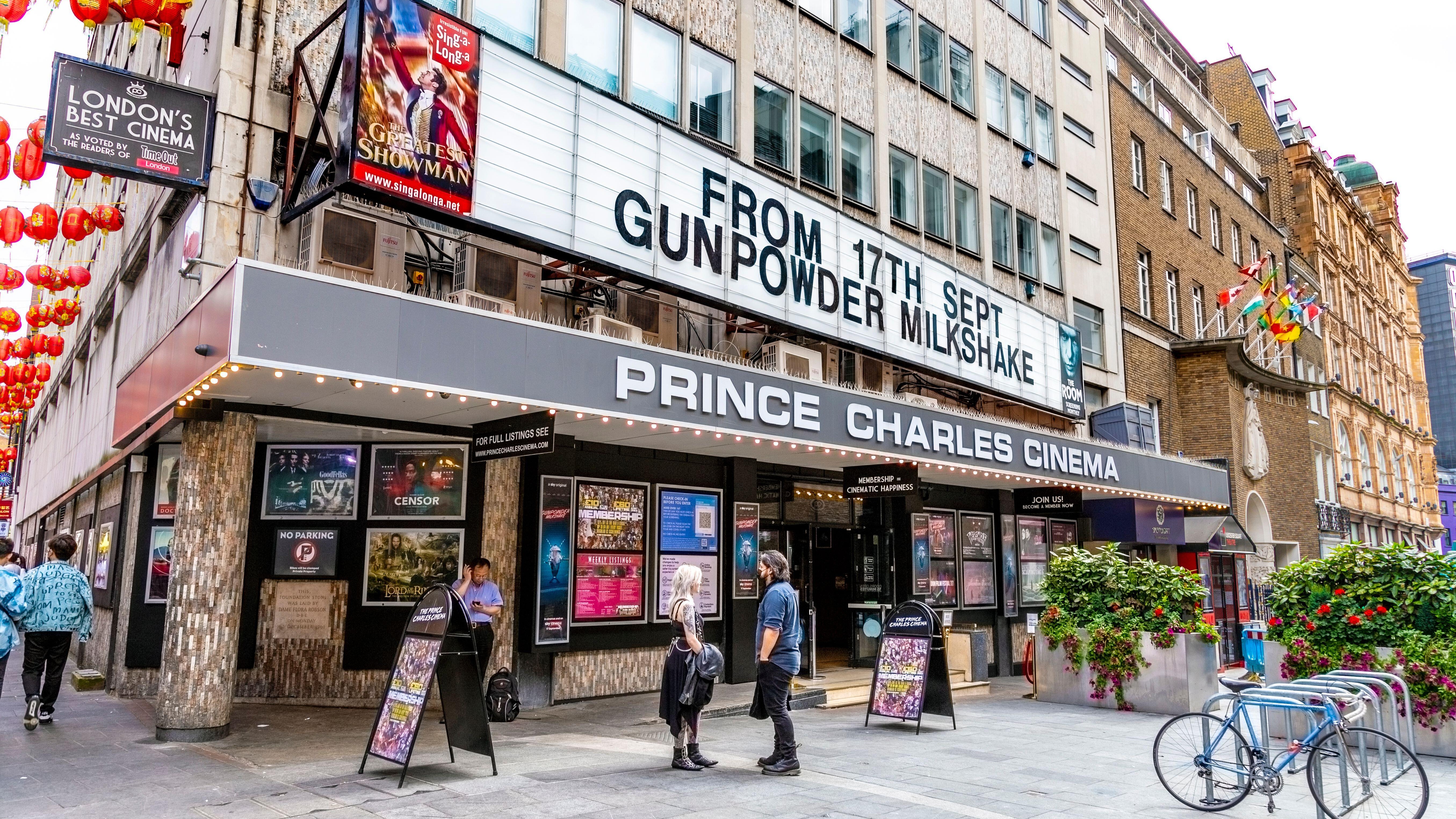 The Prince Charles Cinema, with a few people standing outside. It is daytime.