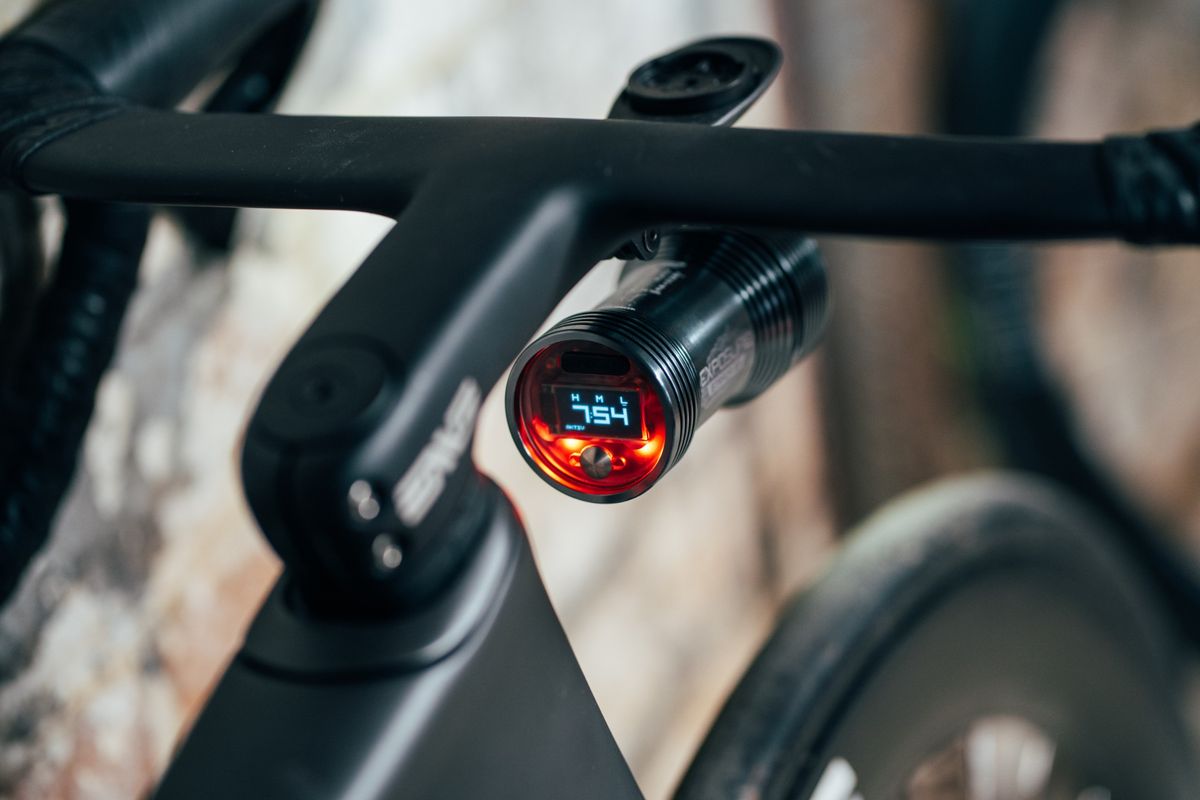 The Exposure Strada 13 SB attached to the bars of a road bike