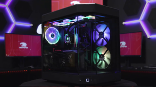 An iBuyPower gaming PC with RGB lighting.
