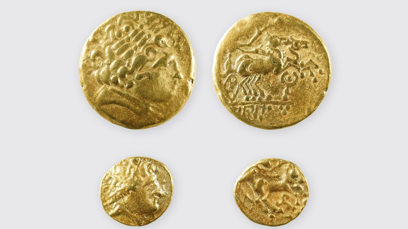 The fronts and backs of two ancient gold coins on a gray background. On the front we see the profile of Apollo. On the back we see horses pulling a chariot.