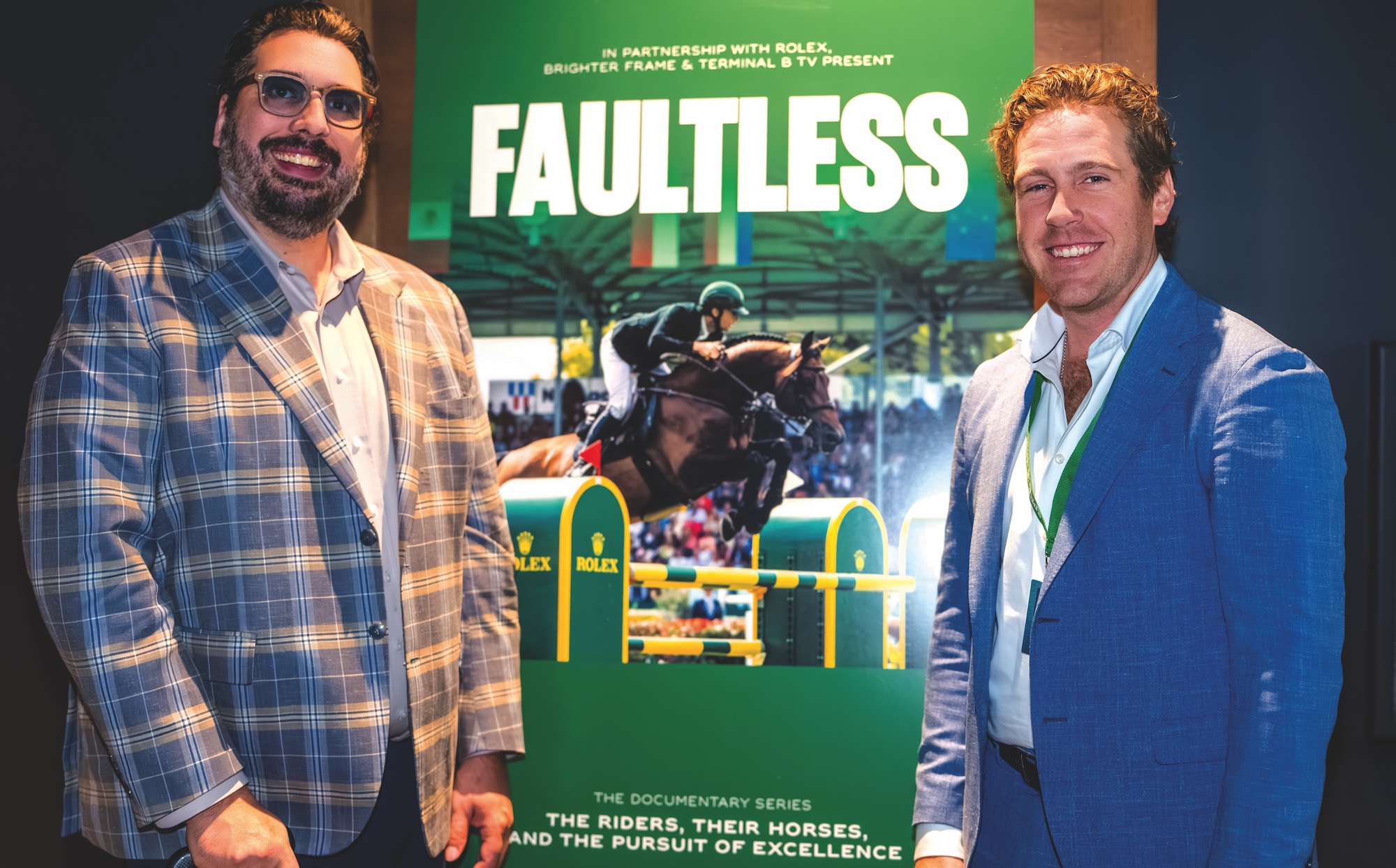 Ben Asselin and Kyle Koss beside Faultless billboard