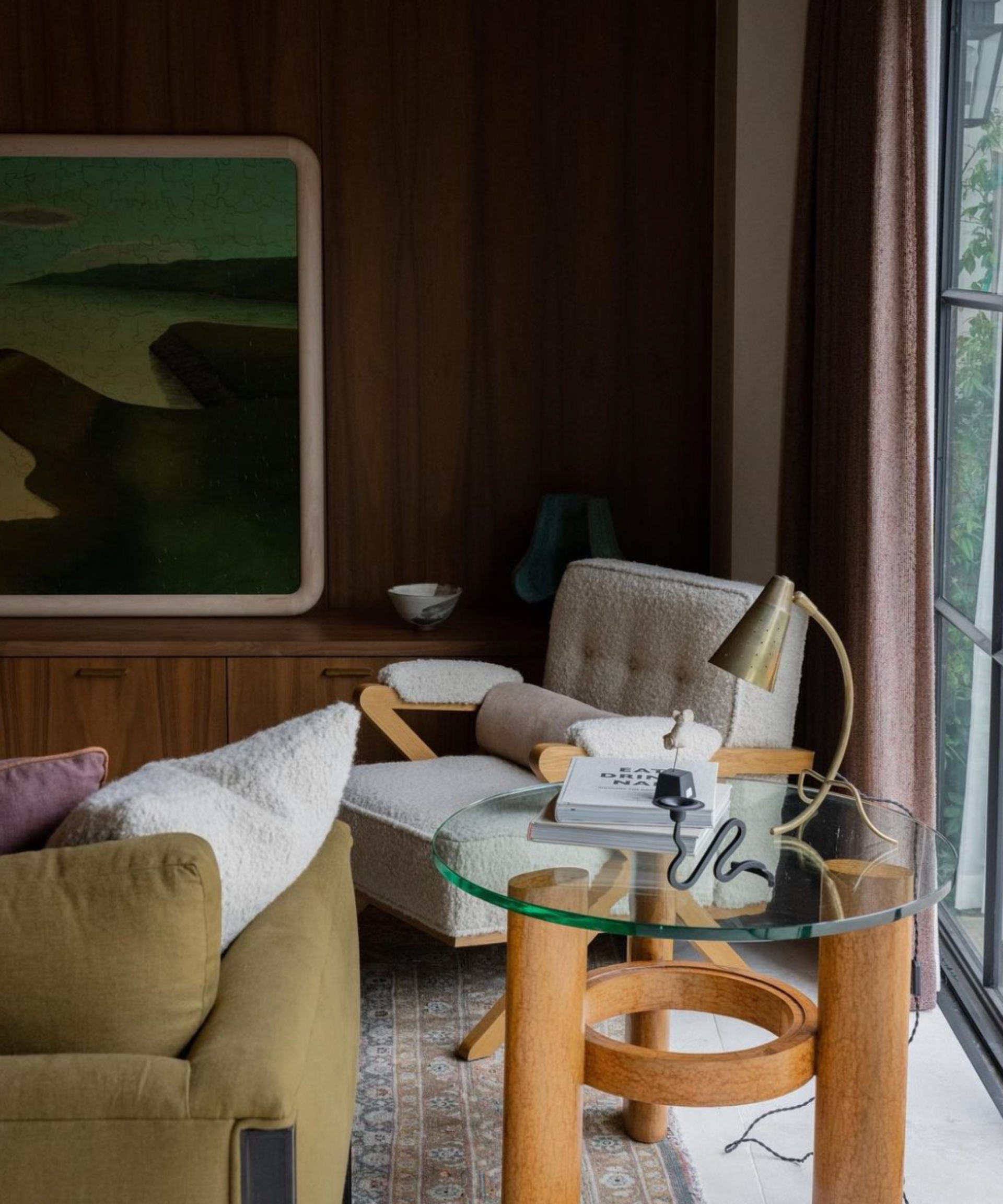 A living room with mid-century modern furniture.
