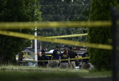 FBI officials investigate after a shooting during a congressional baseball practice