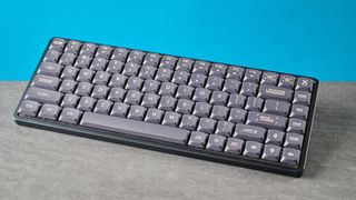 A black Iqunix Magi75 mechanical keyboard