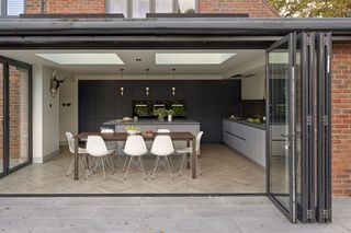flat roof windows and bifold doors in kitchen extension