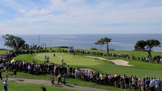 A green pictured next to the sea during the Farmers Insurance Open
