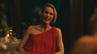 Leslie Bibb in red in The White Lotus