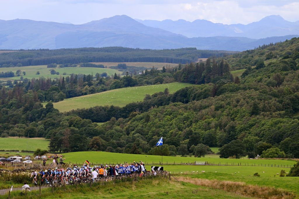 GLASGOW SCOTLAND AUGUST 06 A general view of the peloton compete climbing to the Crow road 333m during the 96th UCI Cycling World Championships Glasgow 2023 Men Elite Road Race a 2711km one day race from Edinburgh to Glasgow UCIWT on August 06 2023 in Glasgow Scotland Photo by Dario BelingheriGetty Images