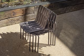 Stack of recycled outdoor chairs by Very Good & Proper