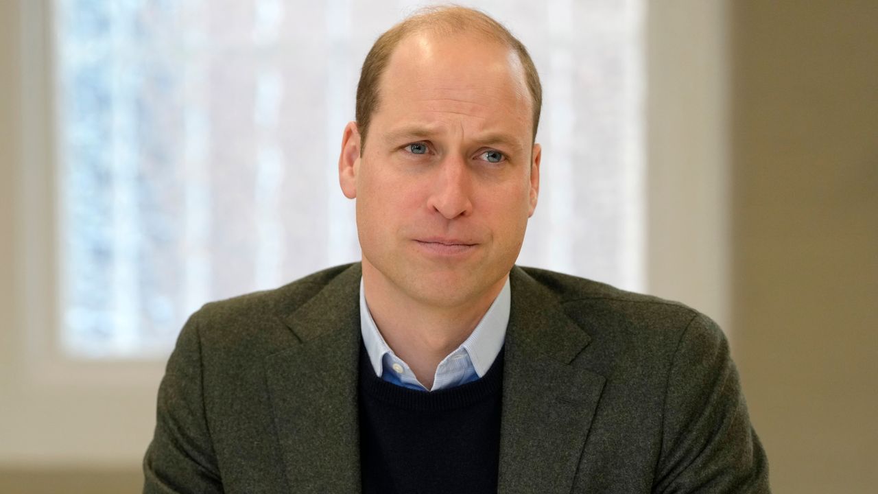 Prince William&#039;s message of gratitude revealed. Seen here he listens to members of staff 