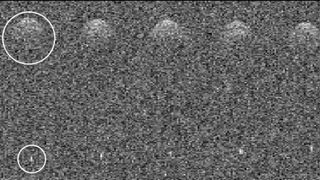 Grainy photos of asteroid 2011 UL21 and its new companion