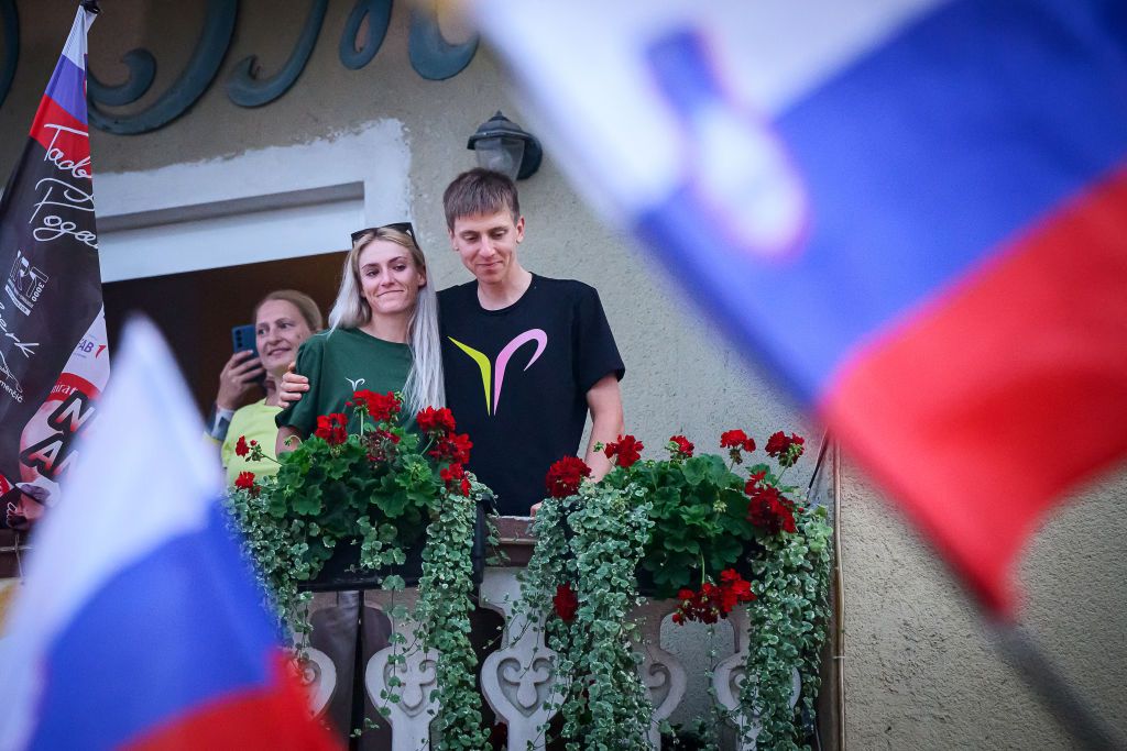 Tadej Pogačar and Urška Zigart at a celebration of his Giro d&#039;Italia-Tour de France double in Slovenia