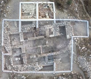 A composite aerial photograph of the massive house on the highest part of the mound of Tel Eton in the central part of Israel.