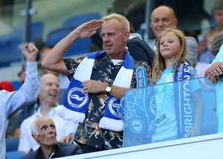 Norman Cook aka Fatboy Slim in the stands at the AMEX Stadium