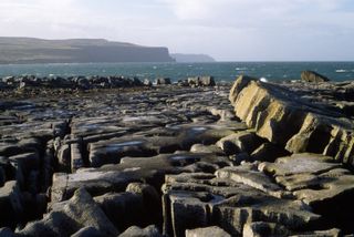 Co.Clare, The Burren, With Distant Cliffs Of Moher, Co Clare, Ireland