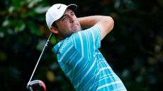 Scottie Scheffler takes a shot at the Tour Championship at East Lake