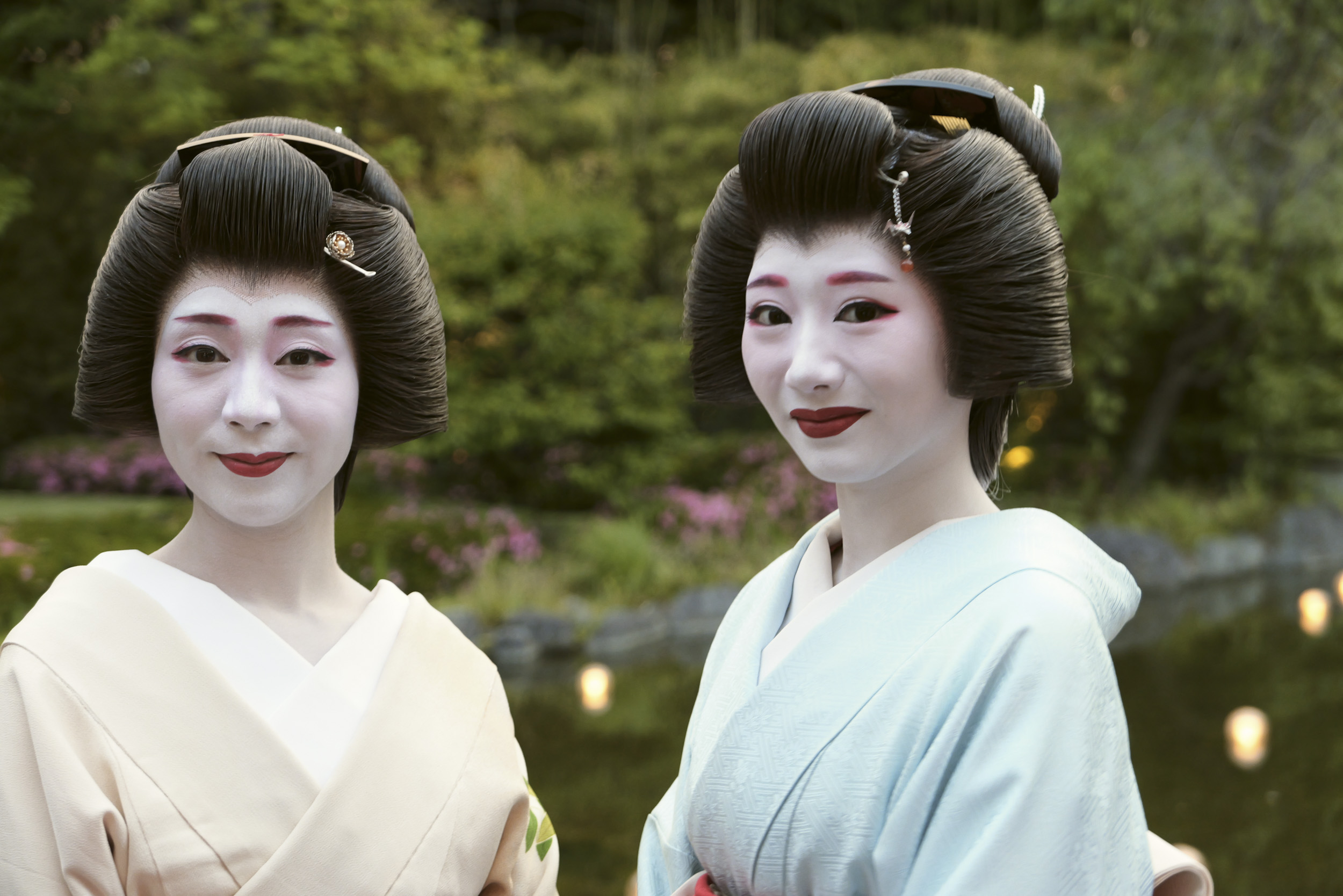 Sample image taken with the Panasonic Lumix L10; two ladies in a traditional Japan ware in attractive garden with pond