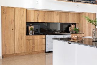 wooden kitchen units with range cooker