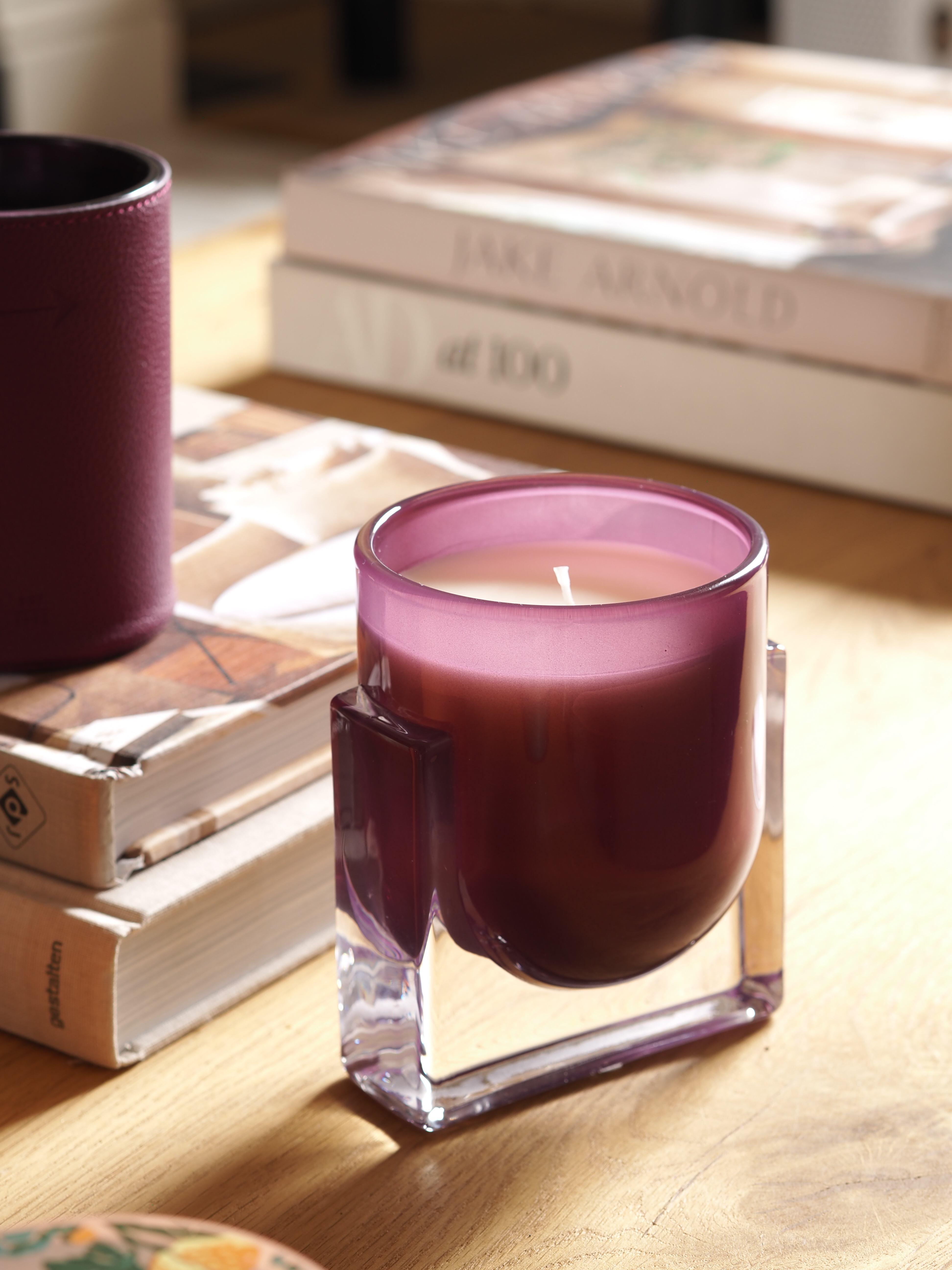 a purple glass candle