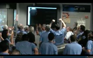 MSL Team Members See First Thumbnail from Curiosity Rover on Mars