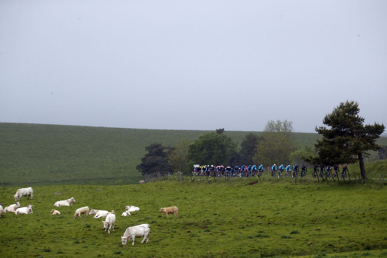 The riders make their way through the countryside