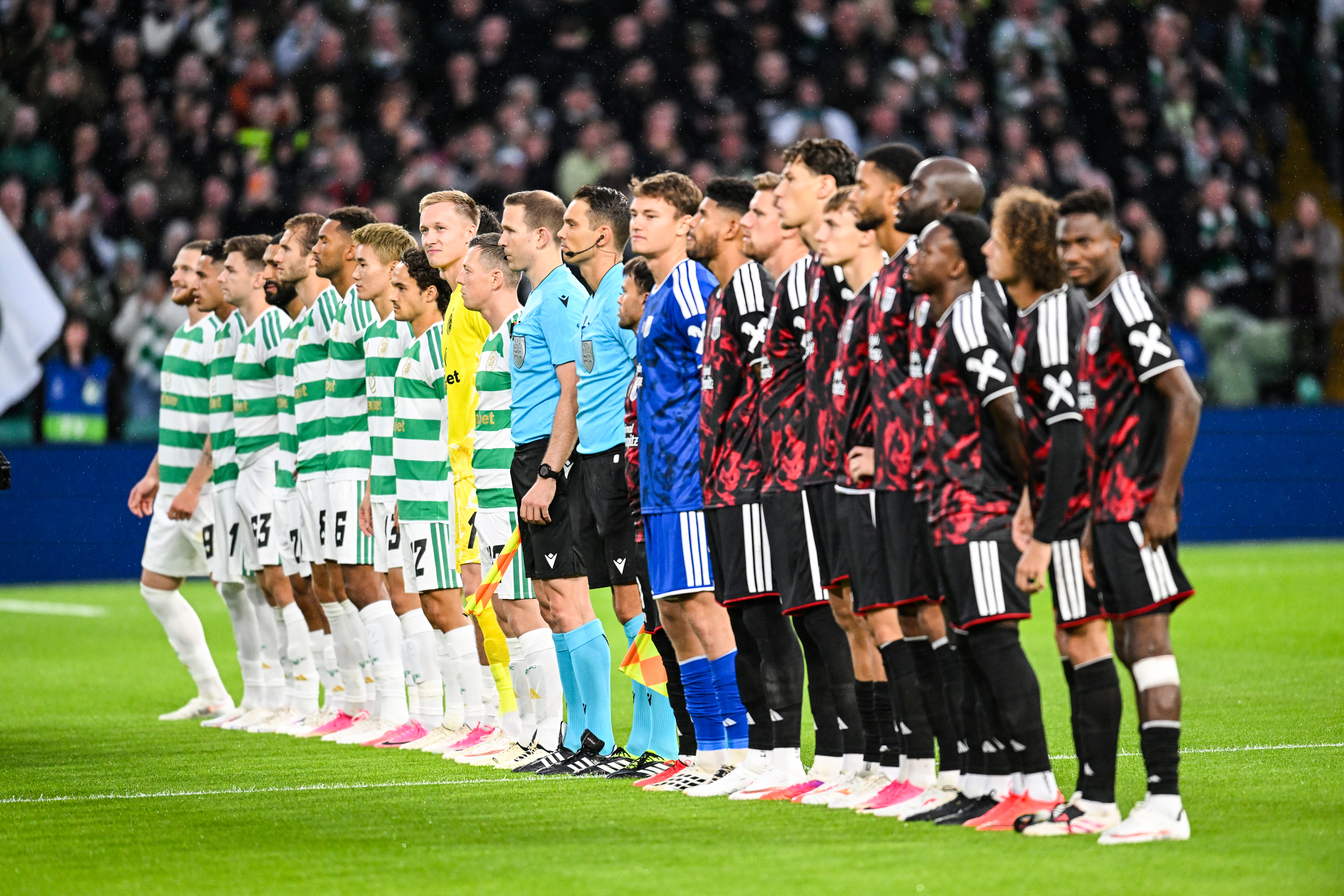 GLASGOW, SCOTLAND - AUGUST 19: The Celtic and LASK squads line up before a UEFA Champions League Play-Off Round first-leg match between Celtic and LASK, at Celtic Park, on August 19, 2026, in Glasgow, Scotland.  (Photo by Rob Casey/SNS Group via Getty Images)
