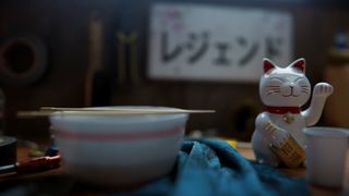 Forza Horizon 6 screenshot from the debut trailer showing a cat figurine next to a bowl