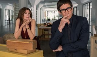 Velvet Buzzsaw Rene Russo and Jake Gyllenhaal look over a piece of art