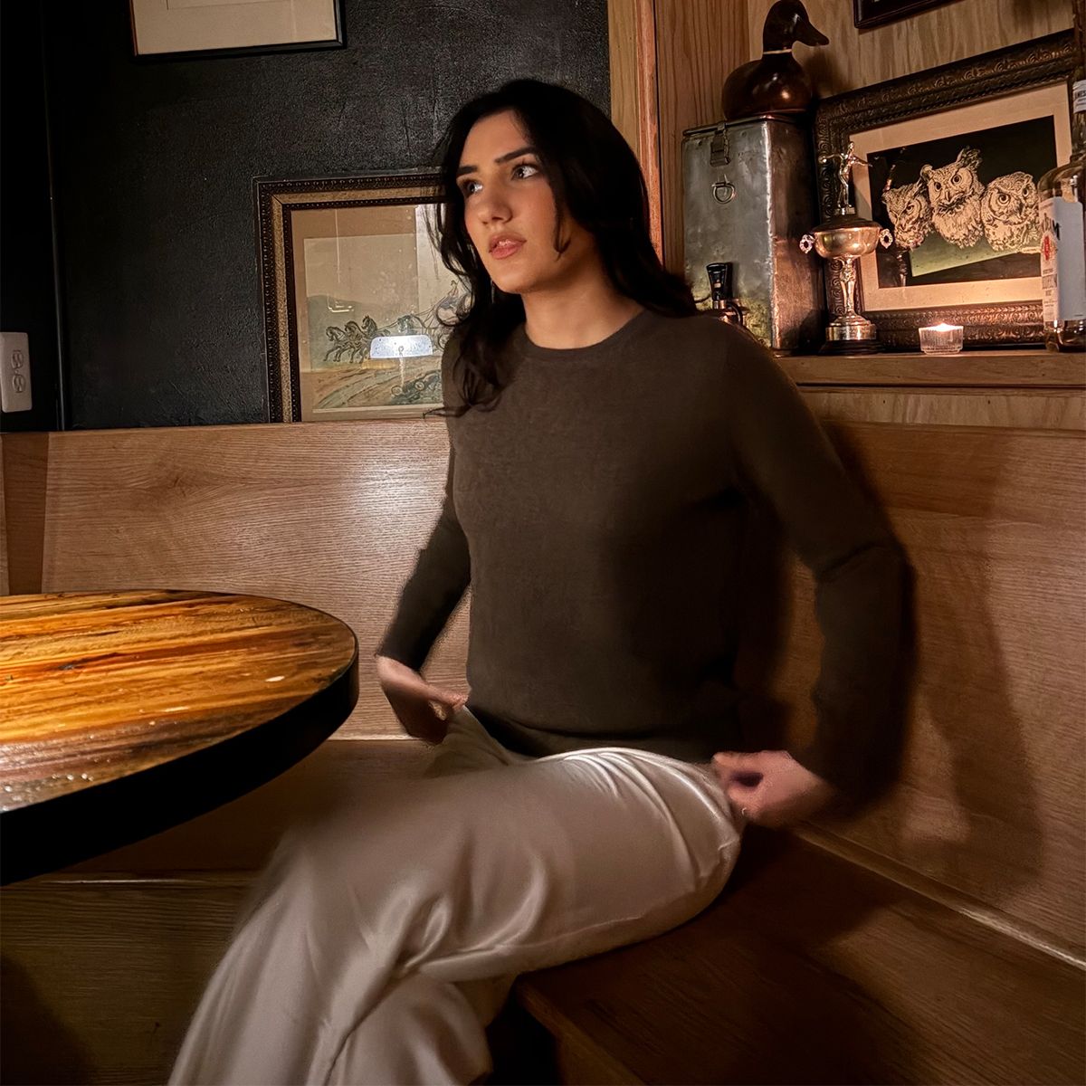 WWW assistant shopping editor wears the Quince Mongolian Cashmere crewneck in brown