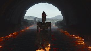 IG-11 walking through a lava river in The Mandalorian