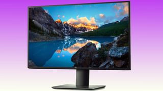 Dell UltraSharp U2720Q monitor on a purple background