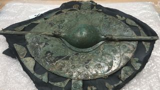 About 30 inches (75 centimeters) in diameter, this shield was found in July 2018; but it wasn't until conservation was complete that its decorations and details could be seen.