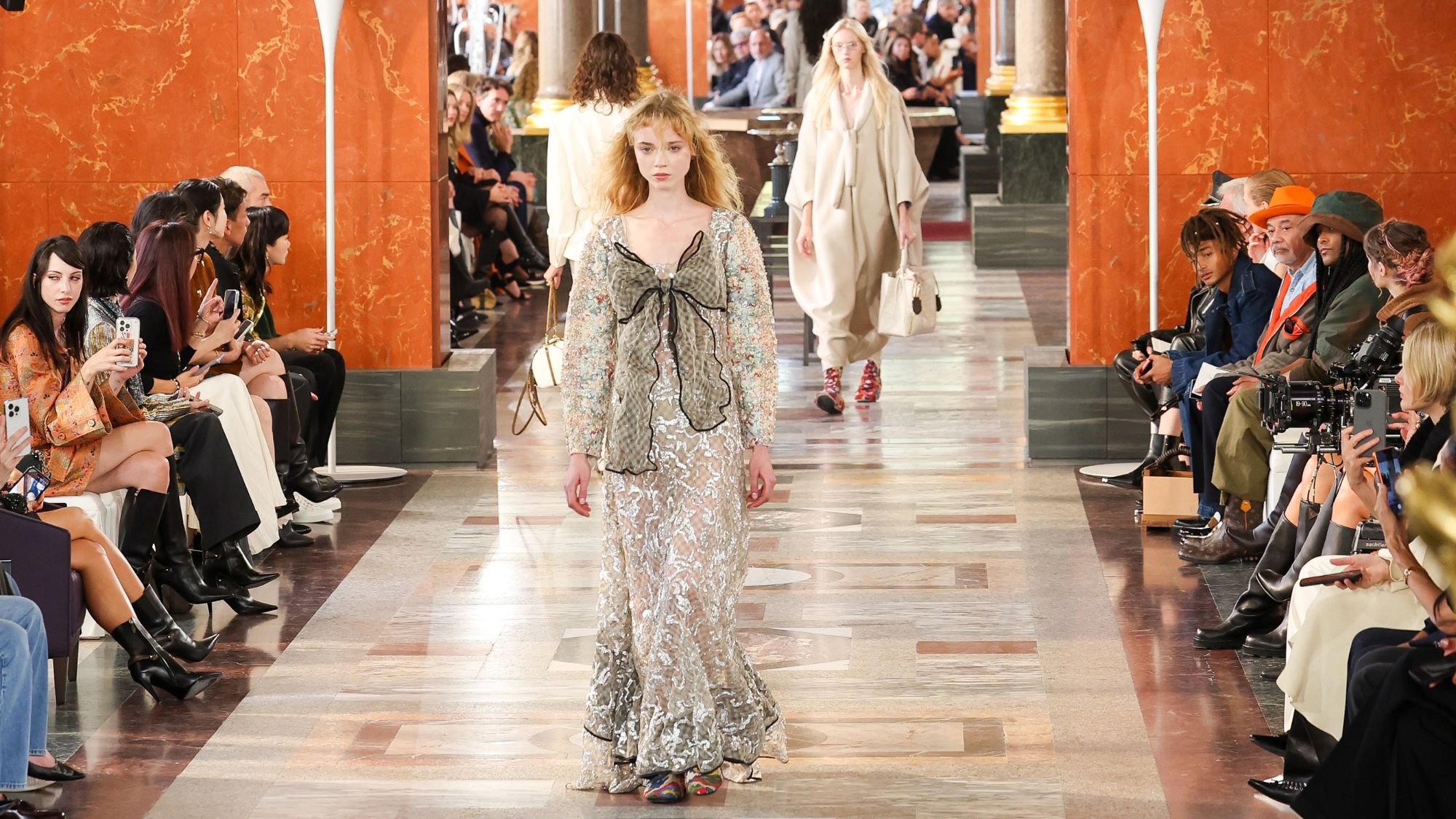 a model walks the runway at the louis vuitton ss26 show in paris