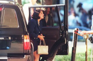 This 06 August file photo shows former White House intern Monica Lewinsky arriving 06 August 1998 at the US District Courthouse in Washington, DC to testify before the grand jury about her relationship with US President Bill Clinton.