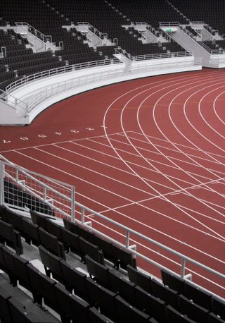 Helsinki Olympic stadium shot by Janne Tuunanen showing track and stalls