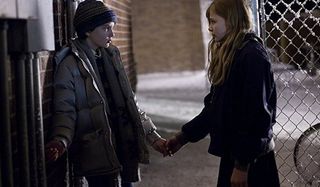 Let Me In Kodi Smit-Mcphee Chloe Grace Moretz Oskar and Eli holding hands