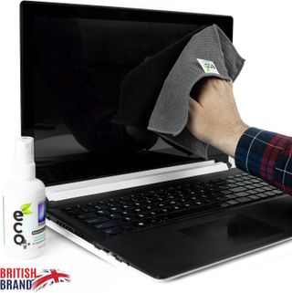 A person cleaning a laptop screen using a grey cloth