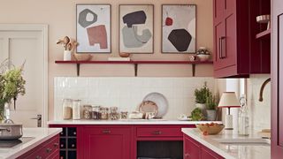 red kitchen and art on walls and shelf that reflect the paint color idea for the kitchen cabinets